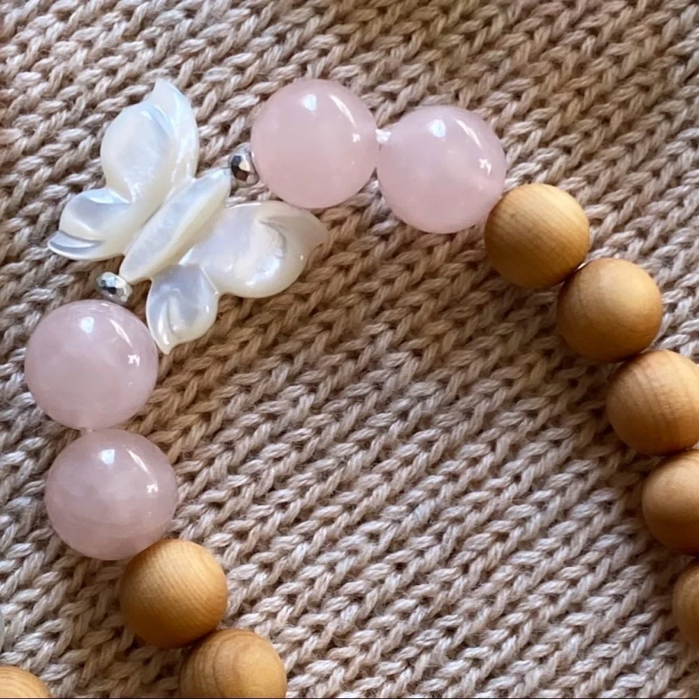 A rose Quartz and butterfly kid’s bracelet